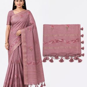Saree elegance with traditional gold accents
